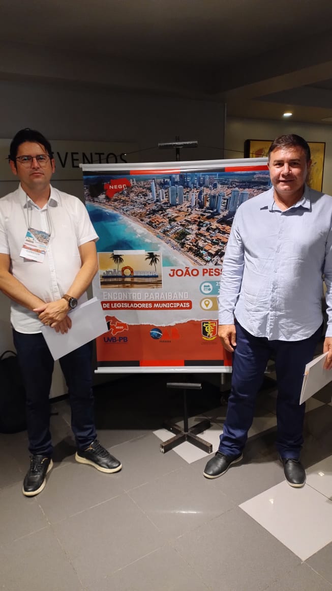 presidente e assessor jurídico e banner do evento.jpeg